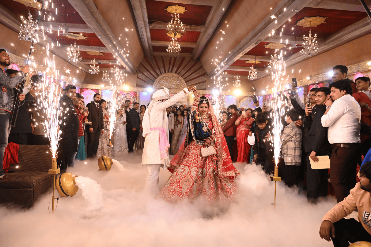 Groom twirling bride during joyful wedding shoot moment